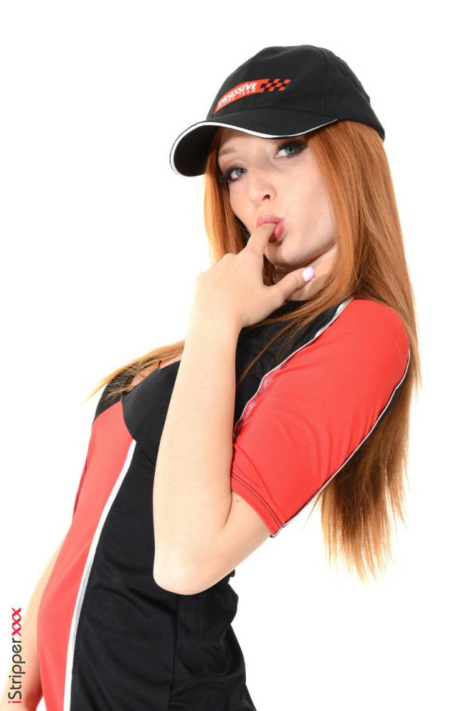 Sexy girl The Red Fox licks a vibrator after a striptease in a ball cap | Photo: 1414835