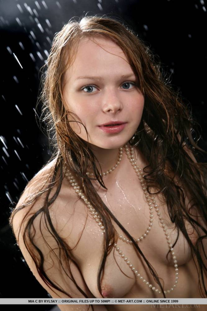 Naked and wet teenage girl Mia C striking erotic solo poses - #10