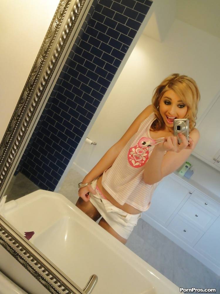 Blonde babe Molly Bennett does sexy self-shots in the bathroom - #1