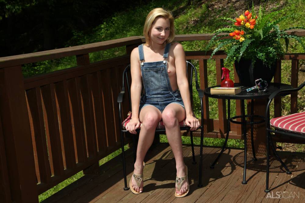 Petite teen Odette Delacroix pees on the deck after a speculum insertion | Photo: 1488307