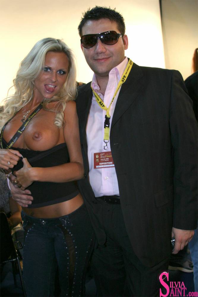 Blonde MILF Silvia Saint fully clothed posing & flaunting big tits at party - #10