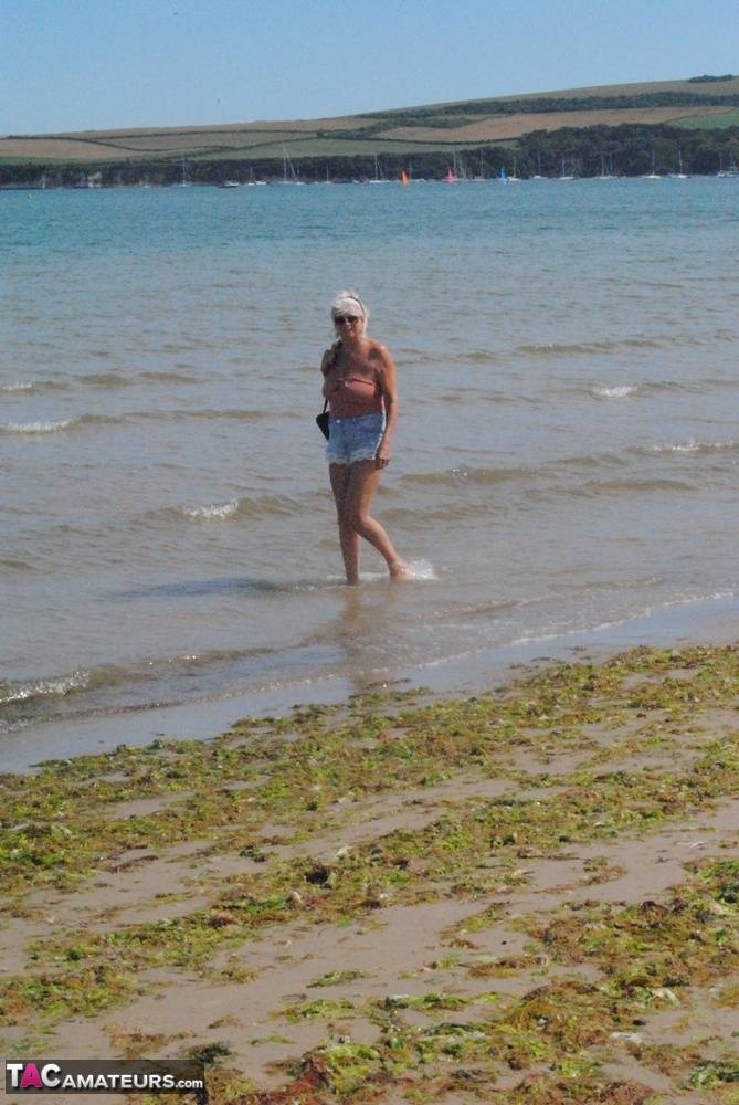 Mature granny Dimonty skinny dipping at the beach with big saggy tits hanging - #14