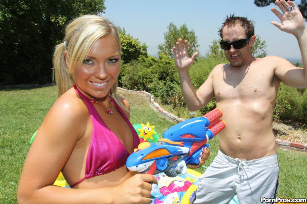 Young blonde Ally Kay ends a water fight by having sex in backyard - #3