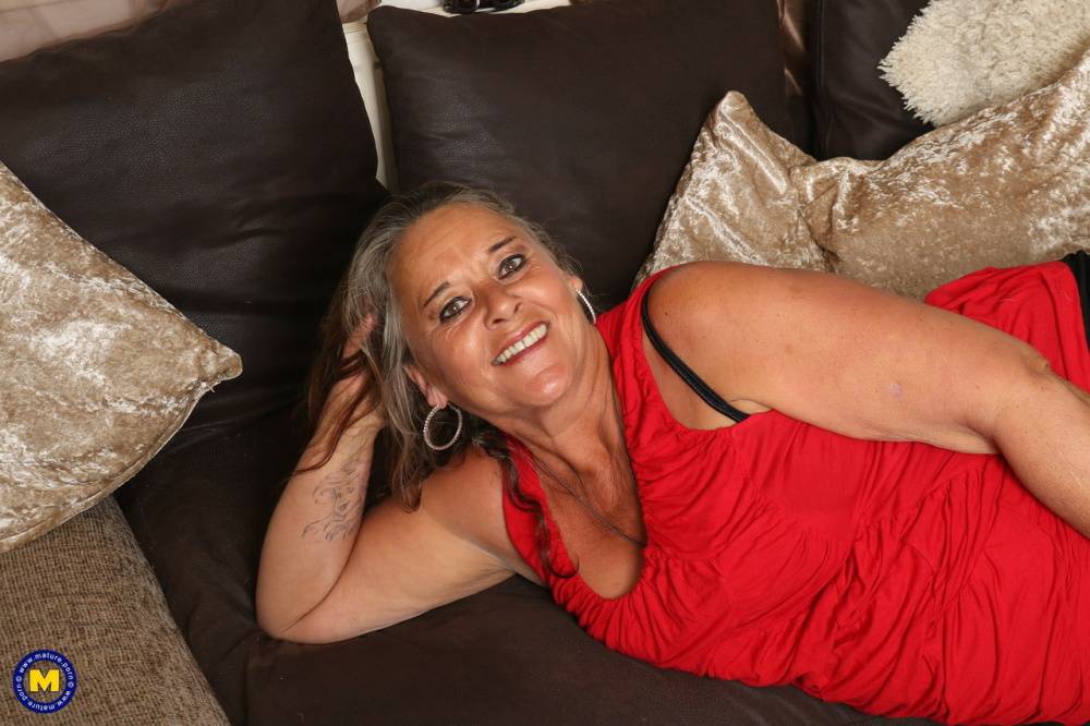Older fatty masturbates on a sofa during candid action around her home - #11