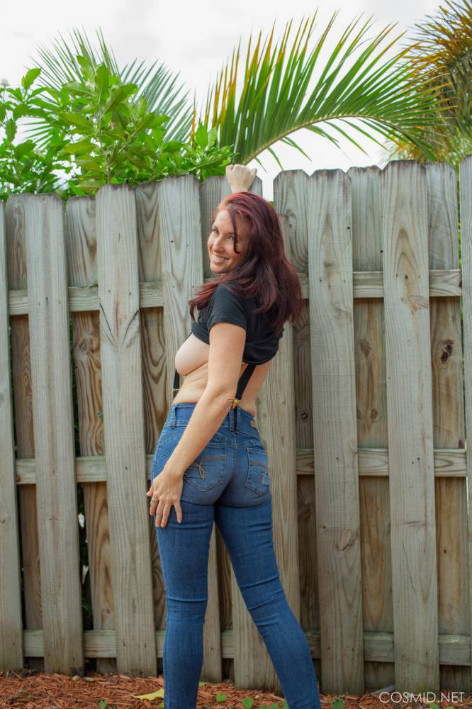 Hot redhead Andy Adams loses her t-shirt & jeans in the yard to pose naked - #4