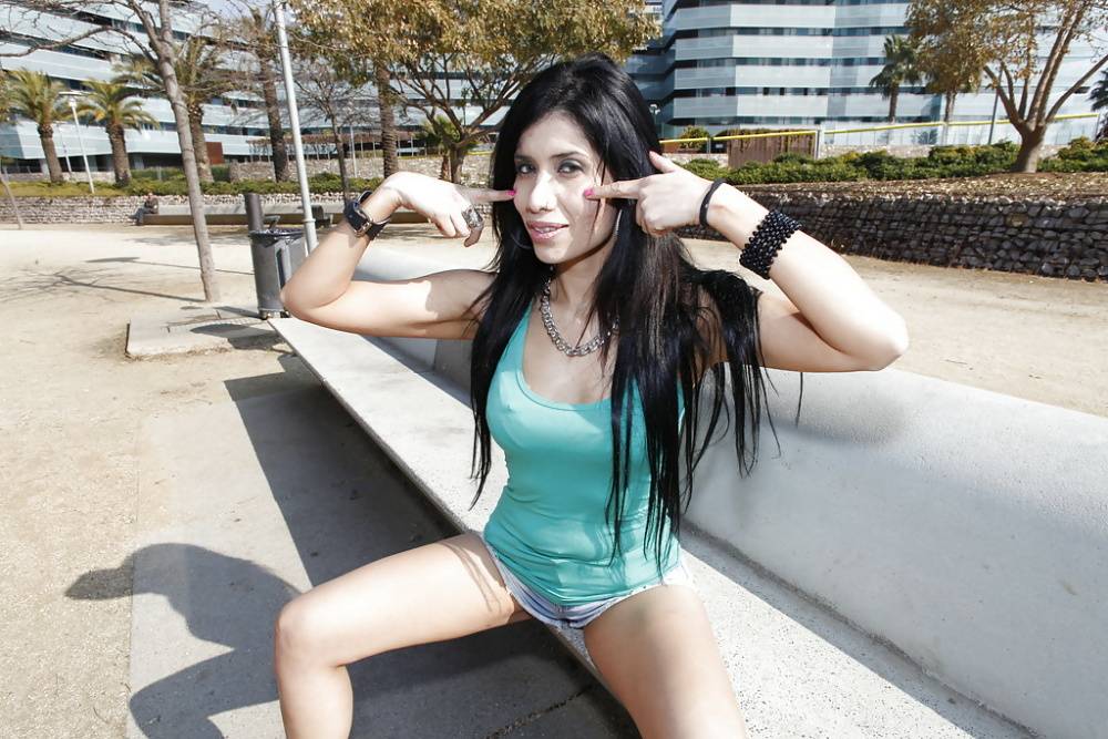 Busty Latina babe Eva Reina flashing her big tits in public - #3