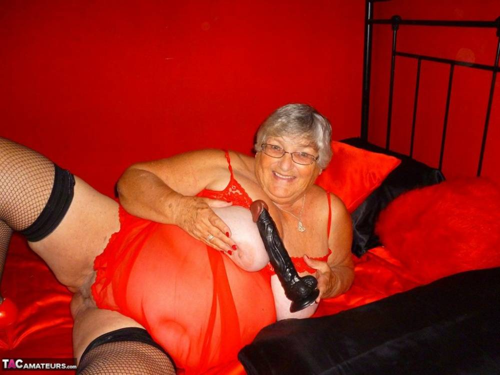 Obese nan Grandma Libby dildos her freshly shaved vagina on a bed - #10