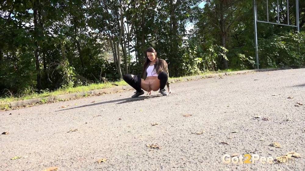 White girl Katy Rose takes a piss on a road while wearing hooker socks - #8