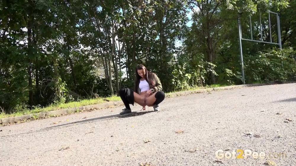 White girl Katy Rose takes a piss on a road while wearing hooker socks - #4