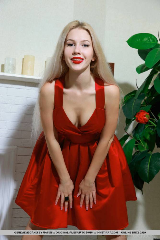 Nice blonde teen Genevieve Gandi removes red dress to display her trimmed muff | Photo: 1598596
