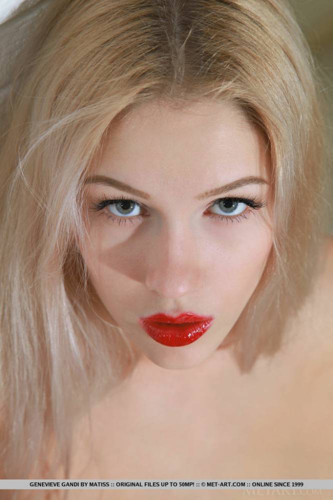 Nice blonde teen Genevieve Gandi removes red dress to display her trimmed muff | Photo: 1598590
