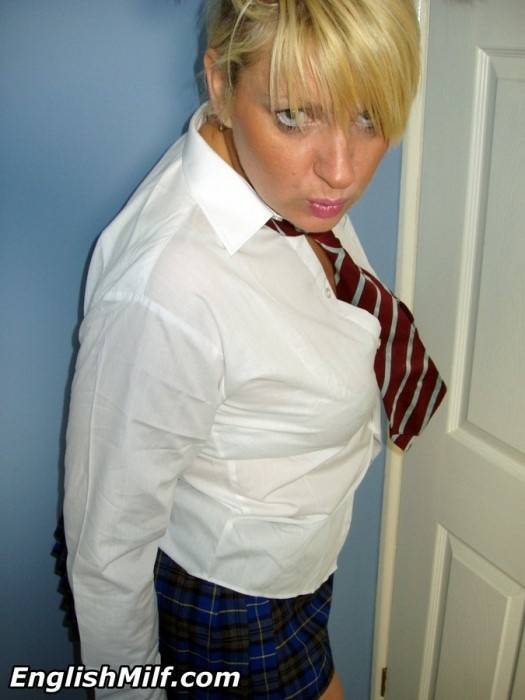 Older UK amateur Daniella English slides panties aside in schoolgirl attire - #11