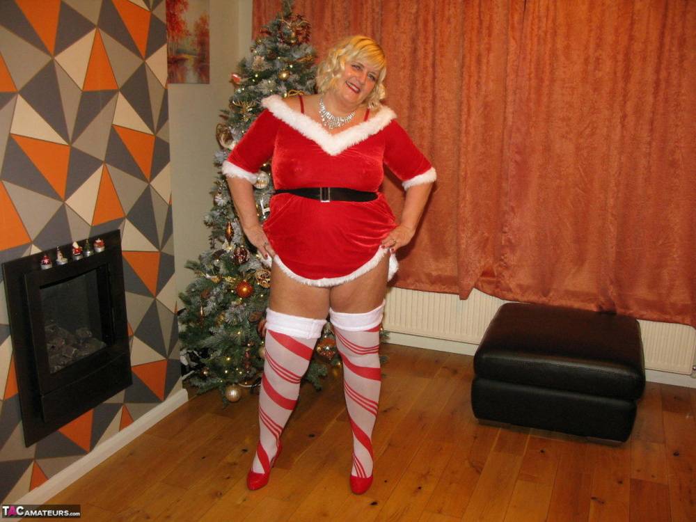 Blonde BBW Chrissy Uk shows her big ass and boobs by a Christmas tree - #4