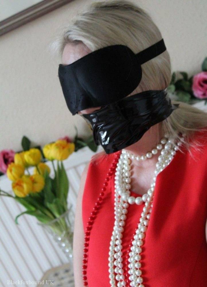 Older blonde is tied up, gagged and blindfolded in a few outfits - #15