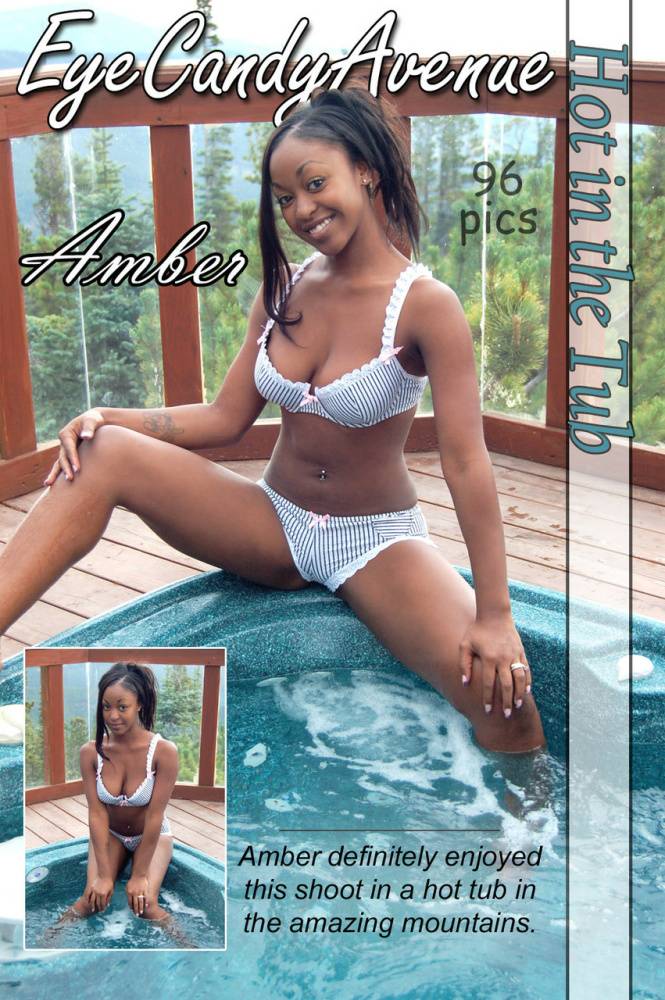 Black girl Amber uncups her big tits while getting in an outdoor hot tub - #11