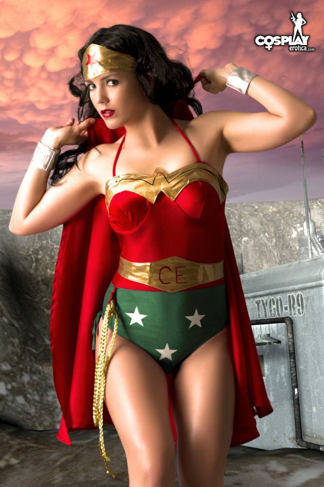 Beautiful brunette peels off her Wonder Woman outfit in a tempting manner - #3