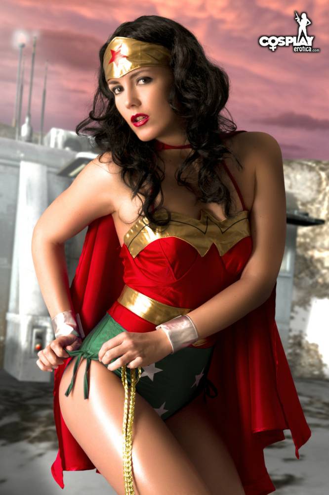 Beautiful brunette peels off her Wonder Woman outfit in a tempting manner - #4