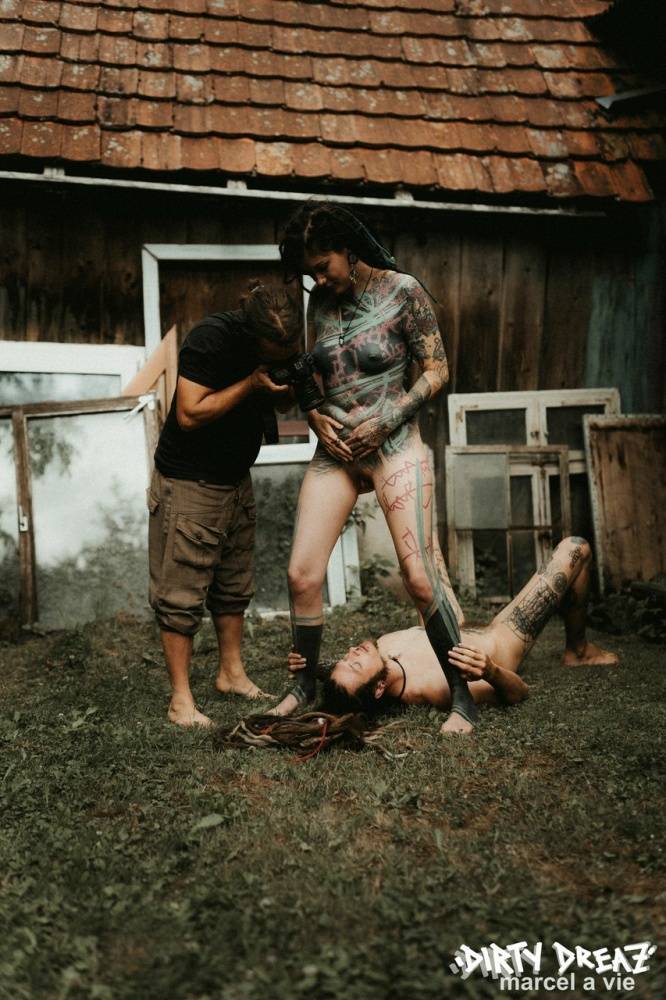 Heavily tattooed girls piss on a naked man outside the back steps of a house - #7