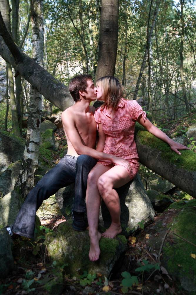 Young girl and her boyfriend have sex on moss covered boulders in a forest - #10