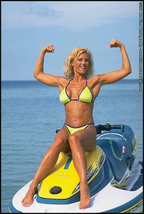 Blonde fitness model Stephanie Metzdorf flexes in a bikini on a jet ski - #4