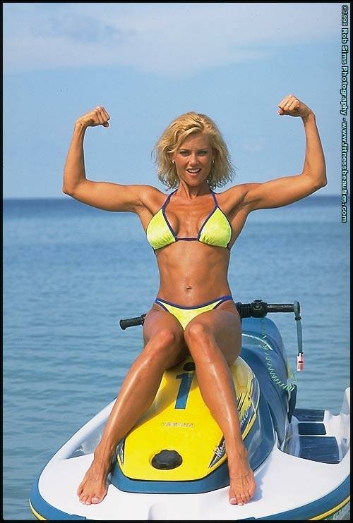 Blonde fitness model Stephanie Metzdorf flexes in a bikini on a jet ski - #7