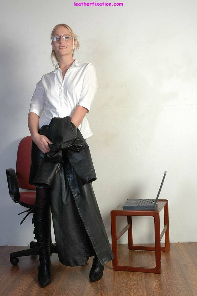 Blonde secretary flashes some thigh in black boots and a leather skirt - #1