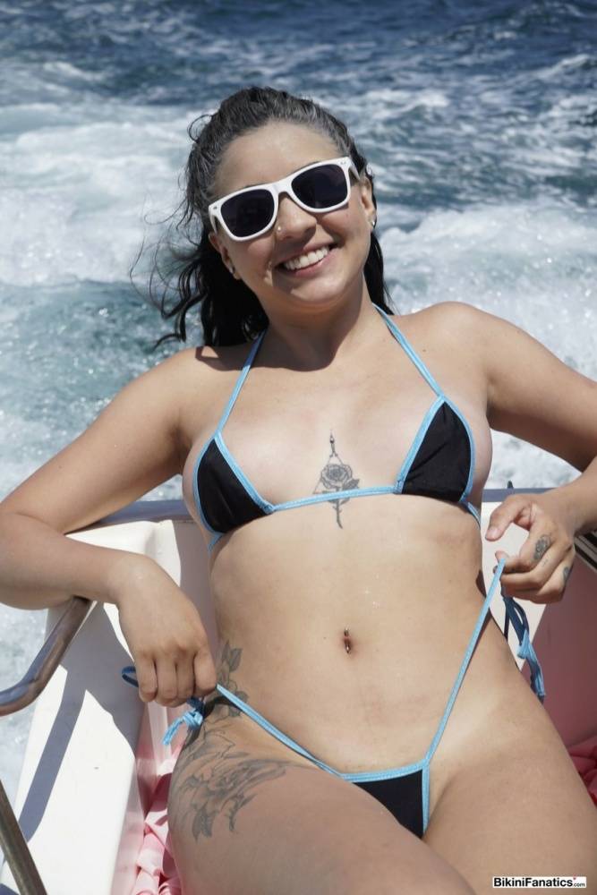 Kitty Angela frees her tits and pussy from a bikini while on a boat - #4