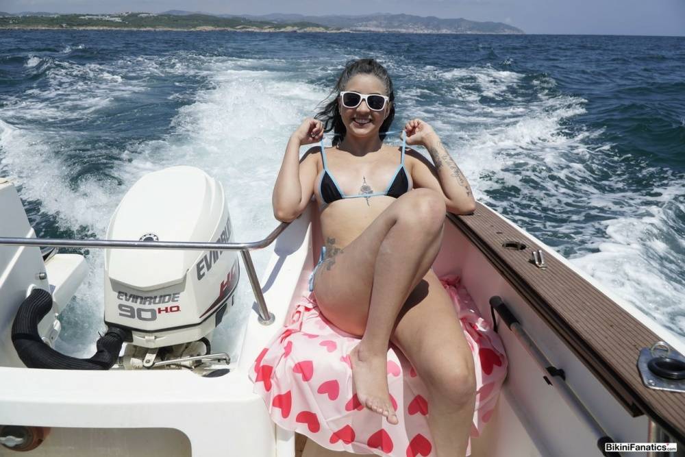 Kitty Angela frees her tits and pussy from a bikini while on a boat - #6