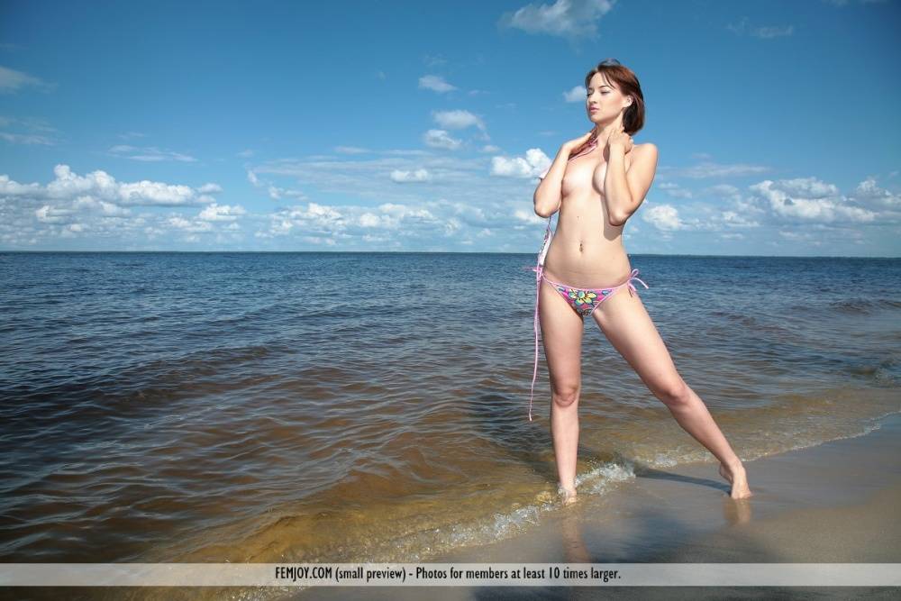 Solo girl Helene F works free and clear of a bikini while at the beach - #5