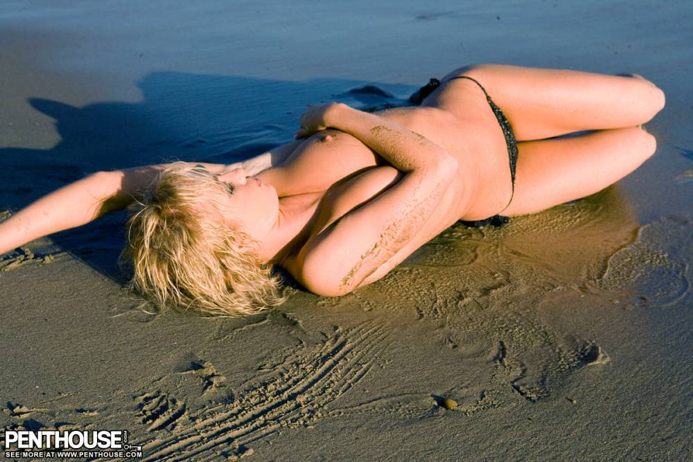 Blonde girl Hayden Miller crawls topless on a beach during a centerfold shoot - #10