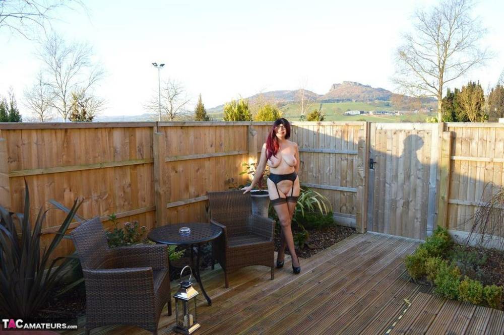 Tall amateur Barby Slut totally disrobes before getting in an outdoor hot tub - #12