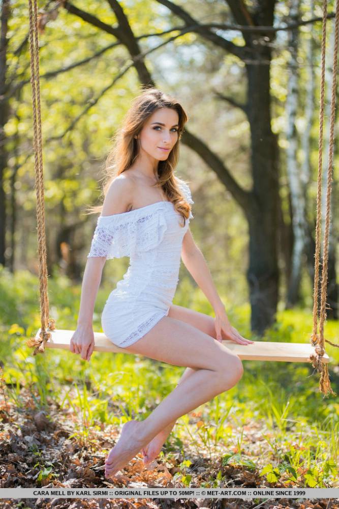Young brunette Cara Mell unveils her great body on a swing in the woods - #2