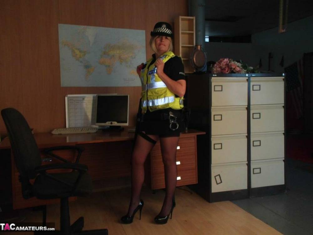 Mature UK policewoman Barby Slut sets her tits free of her uniform - #2