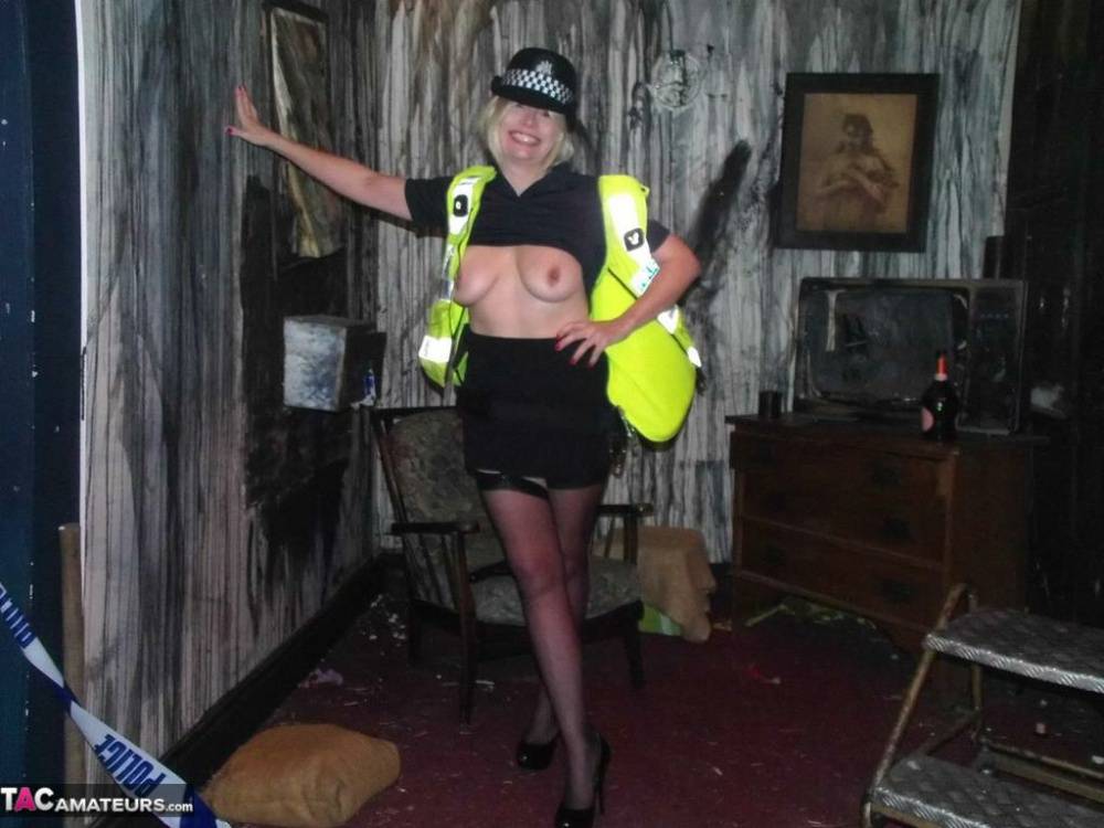 Mature UK policewoman Barby Slut sets her tits free of her uniform - #16