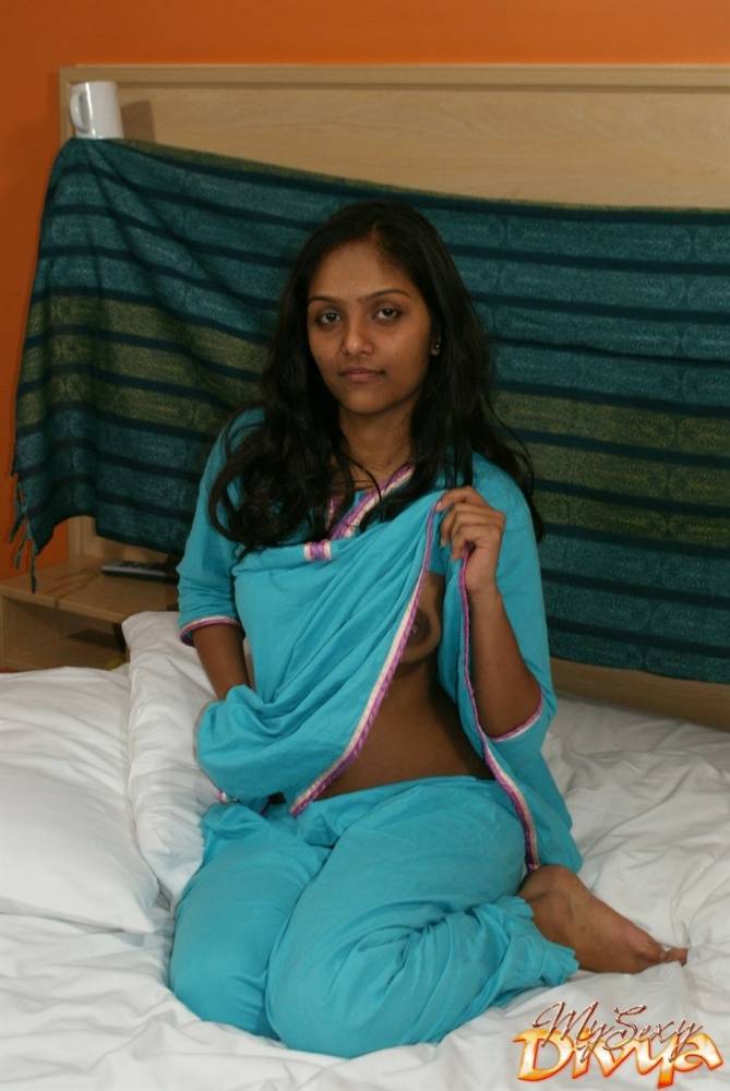 Hot Indian slut Divya removes her shirt to show her big dark nipples - #12