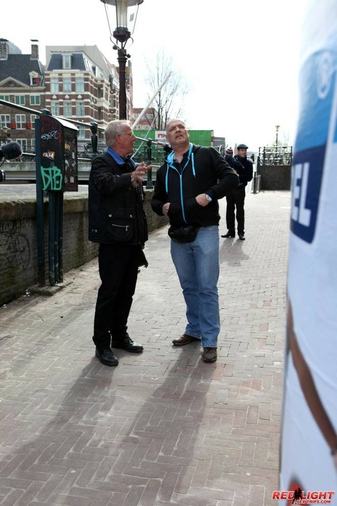 2 old guys enlist the services of a prostitute while visiting Amsterdam | Photo: 131475