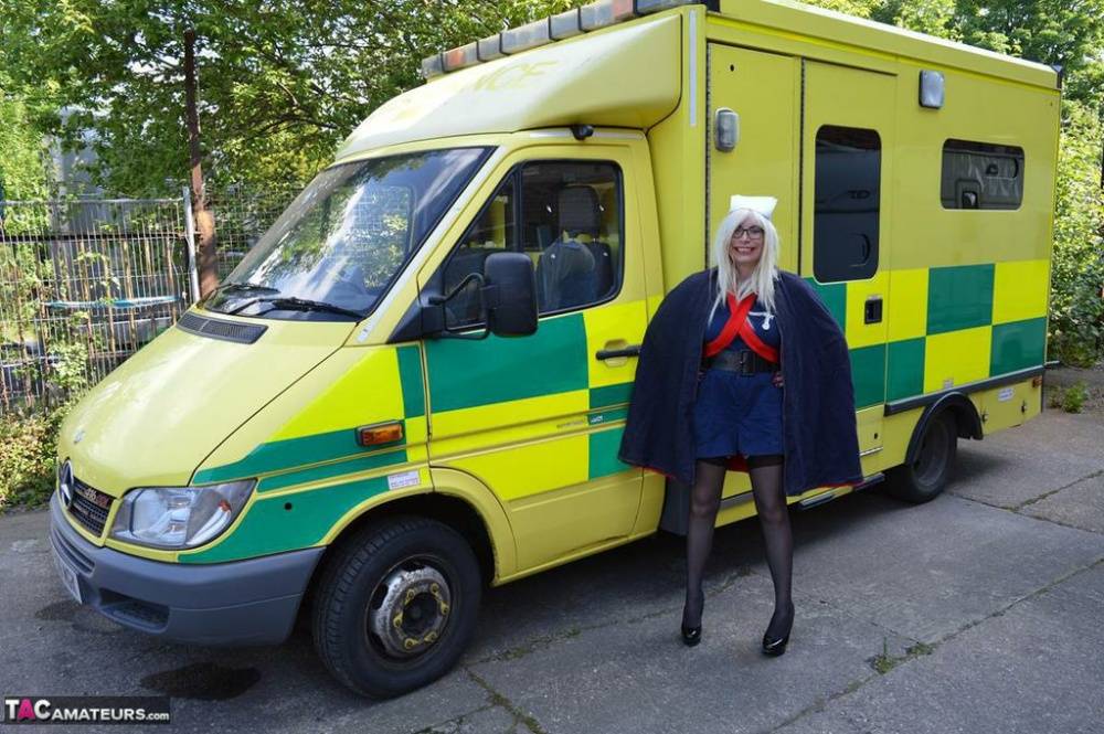 Older blonde nurse Barby Slut gives a blowjob inside an ambulance - #7