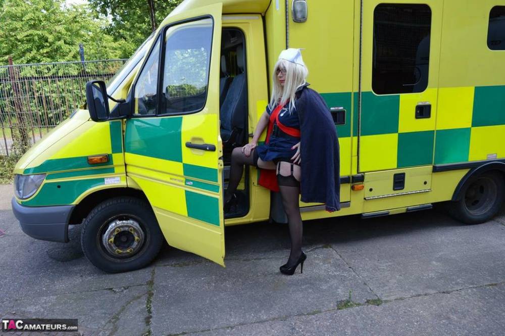 Older blonde nurse Barby Slut gives a blowjob inside an ambulance - #12