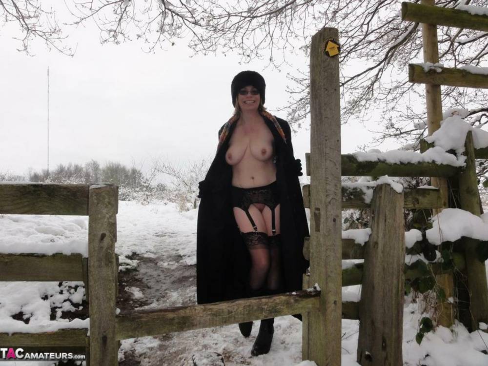 Older amateur Barby Slut exposes herself on snow-covered ground - #11