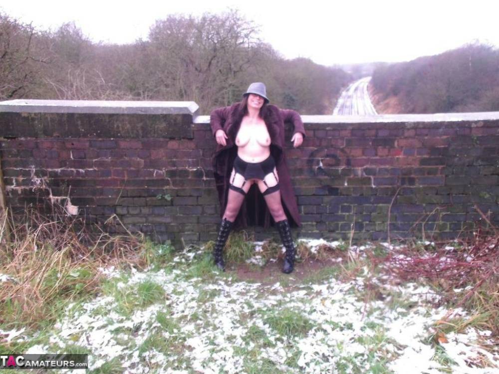 Older amateur Barby Slut exposes herself on snow-covered ground - #15