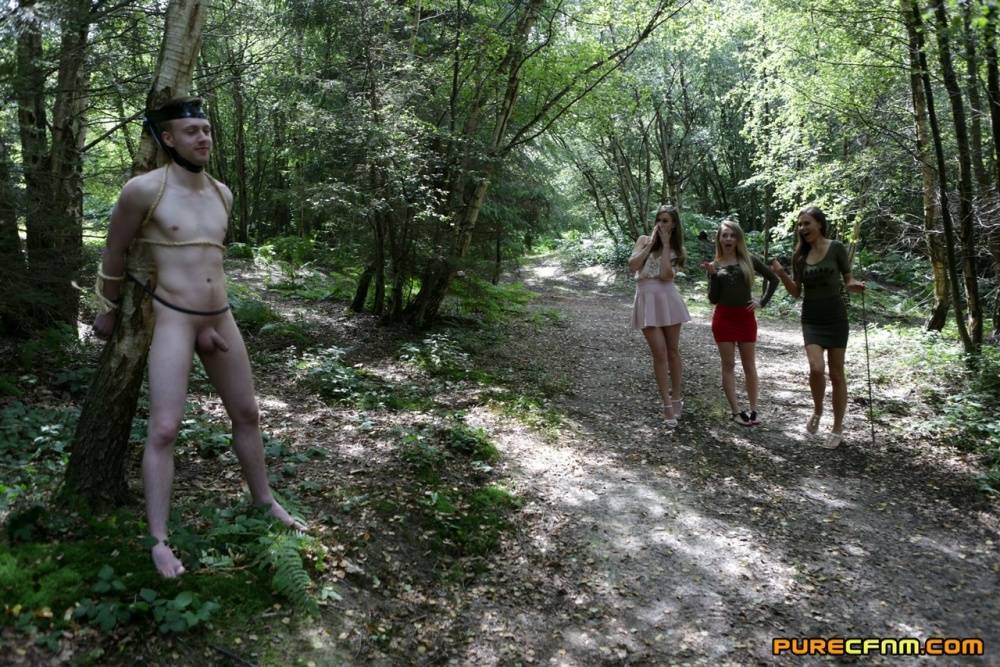 College girls find a man tied to a tree in the woods and suck his naked dick - #7