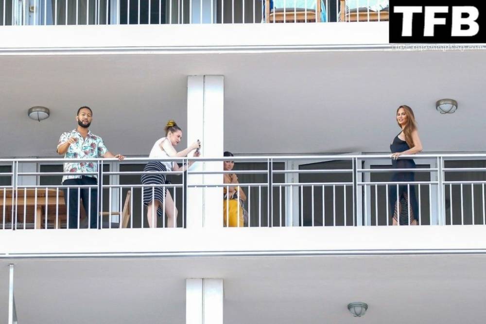 Chrissy Teigen & John Legend Kiss and Pose During an Impromptu Balcony Shoot - #15