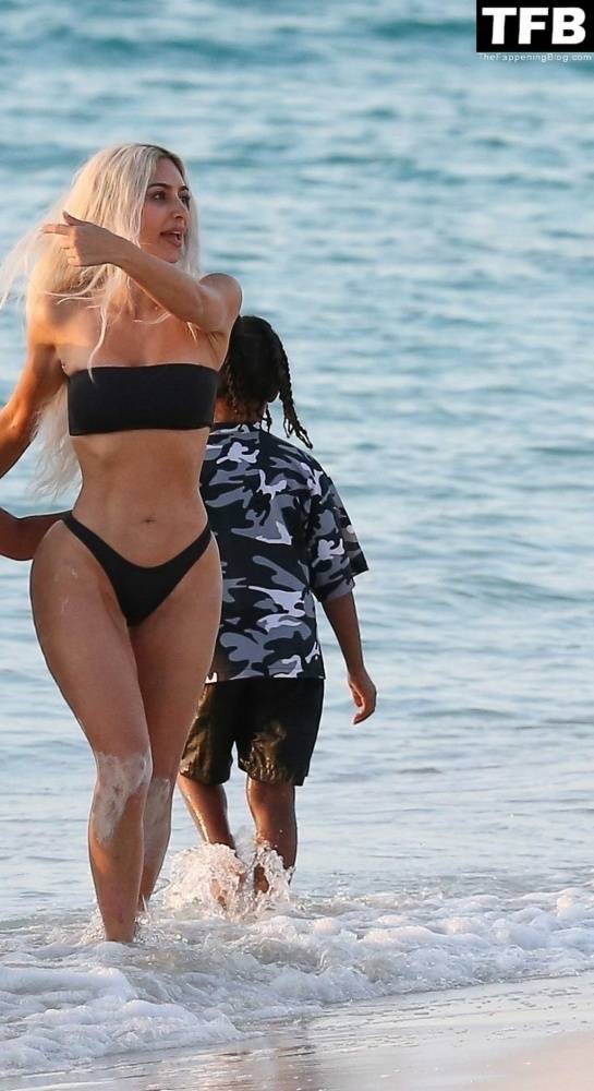 Kim Kardashian Enjoys a Sweet Moment on the Beach During a Family Vacation to Turks and Caicos - #2