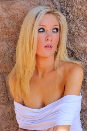 Sexy blonde model Emily gets wild & naughty in her tight white dress | Photo: 23631