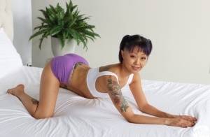 Tattooed Asian girl Saya Song has POV sex with a big white cock | Photo: 37943