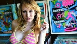 Brett Rossi fingers her pussy in striped OTK socks atop pinball machine - #main