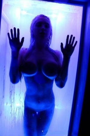 Alix Lynx presses her big tits against a shower stall while taking a shower - #main
