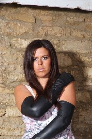 Solo girl Leanne dons long leather gloves before exposing her firm tits - #main