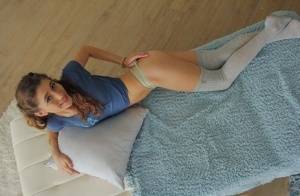 Young girl Rebel Lynn posing solo on bed in long socks and thong panties - #main