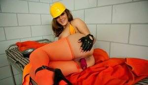 Construction worker Natasha Nice masturbates after finding herself in jail on www.galphoto.com